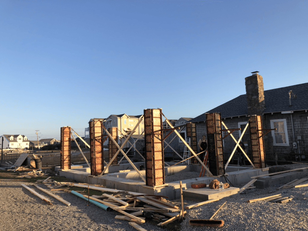 Helical pile foundation installation by NJ&J Builders
